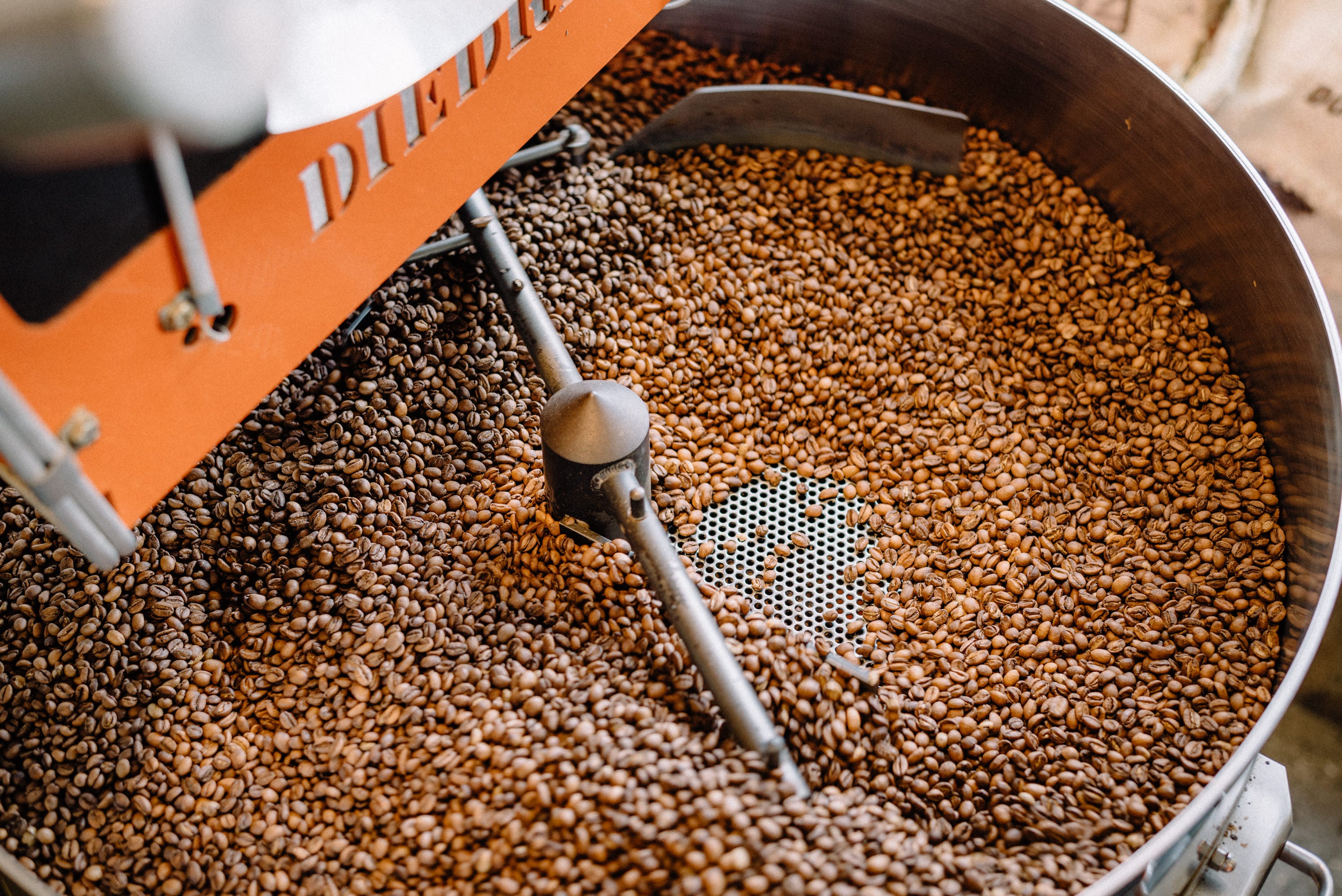 The inside of a coffee bean roasting machine.