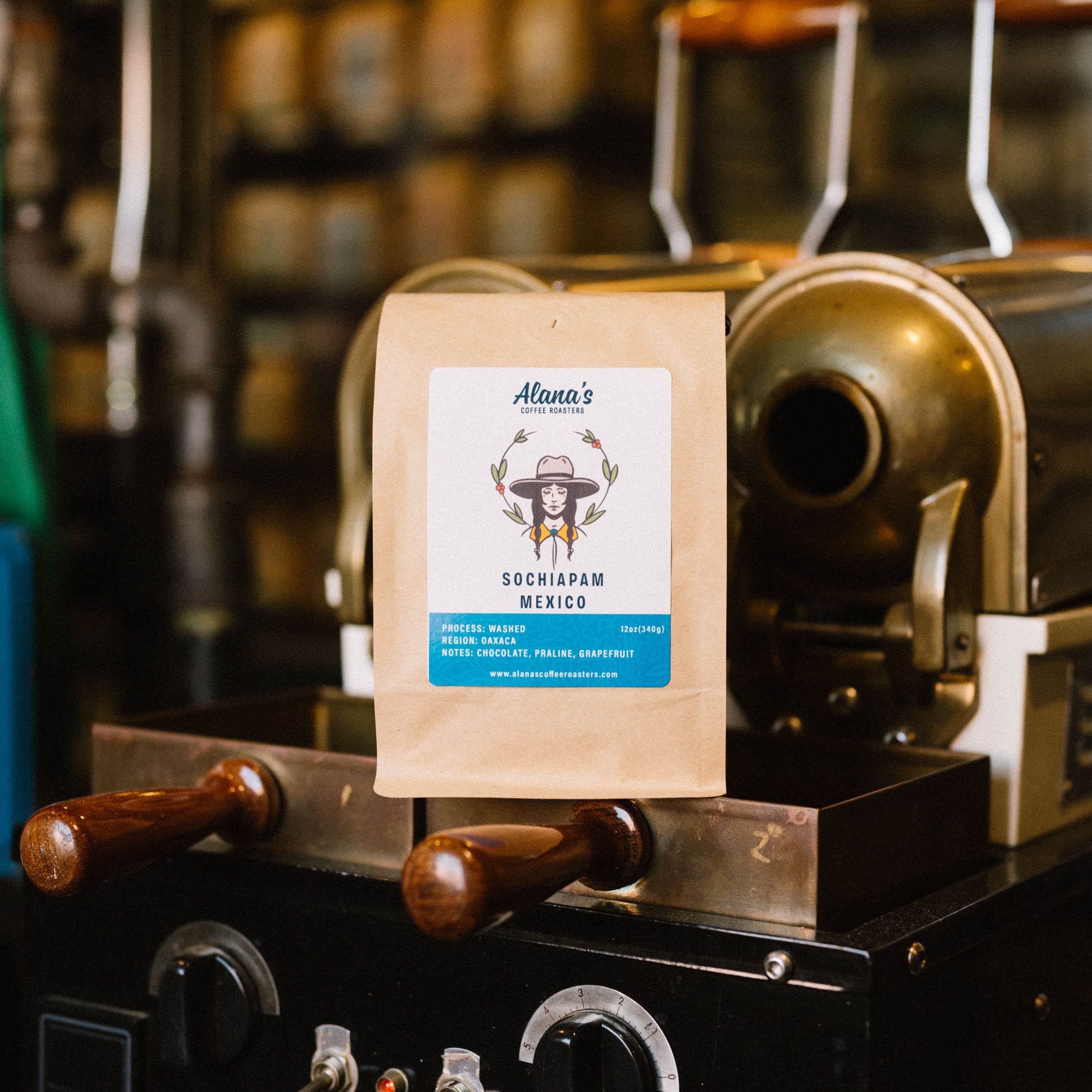 Sochiapam Mexico coffee bag from Alana's Coffee Roasters on a vintage coffee roaster.